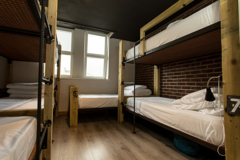 Bunk beds with wood floor at The Nest Boutique Hostel