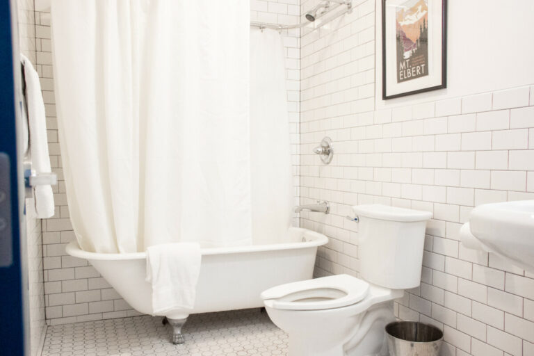Renovated ensuite bathroom with original clawfoot tub in a Private Ensuite Room. 