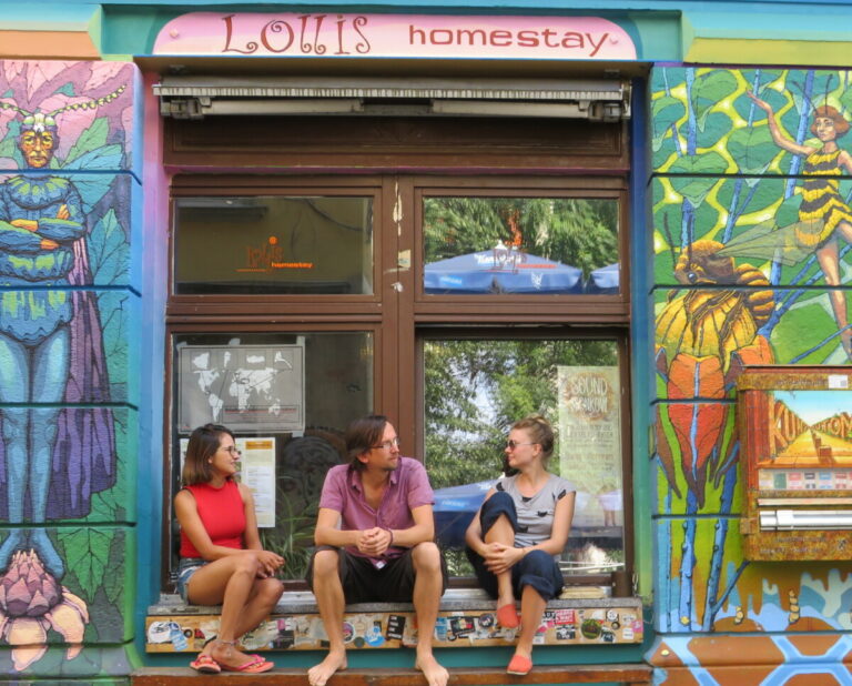 Our artistic facade design next to the hostel entrance welcomes our guests as colorful as we are.